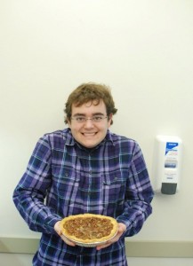 Freshman year Justin baking a pie for a Thanksgiving feast!
