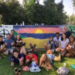 Siena and her sponsor group after painting Walker Wall