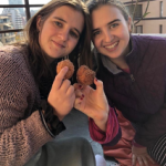 Nelia and her sister with donuts