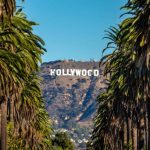 Hollywood sign framed by palm trees