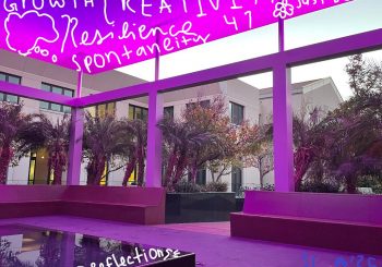 art installation with bright pink light