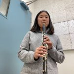 Serena playing clarinet